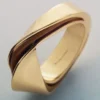 Ormé-Ring Edition, vergoldet mit Kamelleder